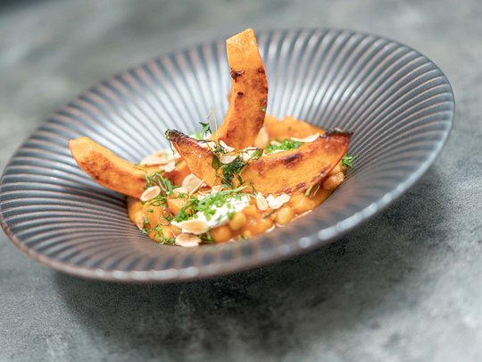 The heights of indulgence in Vent: our restaurant, Die Post Roasted pumpkin slices on chickpea puree with herbs and almond flakes