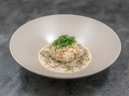 The heights of indulgence in Vent: our restaurant, Die Post Bread dumpling with creamy mushroom sauce and fresh herbs served