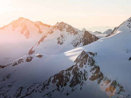 Backcountry skiing near Vent: start directly from our hotel Snow-covered mountain peaks at sunrise